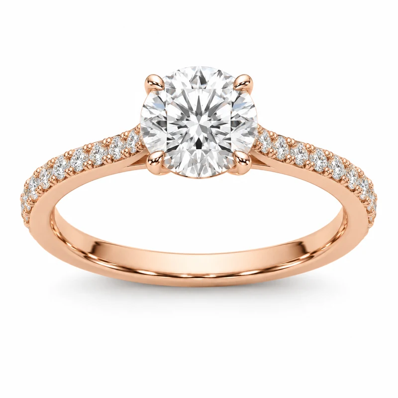 Rose-gold diamond solitaire ring with diamond-pavé shoulders and a complete band, photographed on pure white.